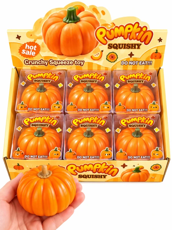 Pudełko dyniowych squishy z ręką.png